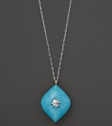 A star burst of white sapphire and sterling silver centers a turquoise pendant. By Elizabeth Showers.