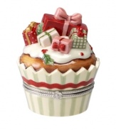 Piled high with presents, this figural cupcake box is a sweet stocking stuffer from Villeroy & Boch's Winter Bakery collection.
