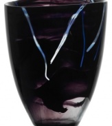 With a smoky black haze and hand-applied bands of eye-catching color, each Contrast vase is truly unique. A simple glass form showcases each stroke and swirl with true artistry. Designed by Anna Ehrner for Kosta Boda.