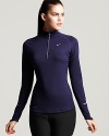 Made with Dri-FIT technology to wick away moisture, pull on this Nike top for travel to and from the gym or for a weekend outdoor run.