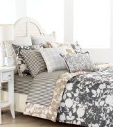 The Mont Clair comforter set incorporates distressed floral stencils in charcoal with a reversed pattern in natural flax. Minimal in color, yet vibrant in pattern, this set from Tommy Hilfiger is perfect for achieving gorgeously understated bedroom style. (Clearance)