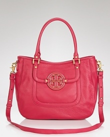 Tory Burch's hobo enlivens classic leather her signature stamp and a must-have hue. From workday to weekend, this versatile bag will make closet staples pop. Tory Burch's hobo enlivens classic leather her signature stamp and a must-have hue. From workday to weekend, this versatile bag will make closet staples pop.