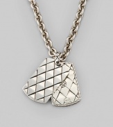 Silver chain with small dog tag pendant, inspired by the naga dragon. Adjustable necklace, 18 to 20 Imported