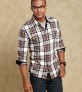 Need to trim down your wardrobe? Add this slim-fit shirt from Tommy Hilfiger to your seasonal style.