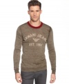 Is it a sweater? Or a logo tee? Armani Jeans makes this pullover in a heathered wool knit as lightweight and easy to wear as a T-shirt.