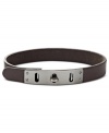 A handsome wrist wrap from Fossil. With a thin design, this leather bracelet showcases a brushed steel accent with turnlock closure. Crafted in gray leather. Approximate length: 9-1/4 inches.