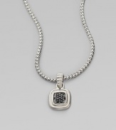 A square pendant with a sparkling black sapphire center on a braided sterling silver chain. Black sapphiresSterling silverLength, about 18Pendant size, about 1½ Lobster clasp closureImported 