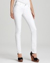 Gleaming silver-toned signature accents enhance the crisp white hue of these MICHAEL Michael Kors jeans, cut in a slim silhouette for a trend-driven look.