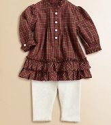 An adorable cotton plaid top adorned with ruffle trim is paired with essential leggings for an unbeatable match. Tunic Ruffled stand collarLong sleeves with ruffle-trimmed barrel cuffsButton-frontRuffled hemLeggings Elastic waistbandScalloped hemCottonMachine washImported Please note: Number of buttons may vary depending on size ordered. 