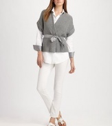 Wonderfully warm knit cashmere, secured at the waist with a satiny silk tie.V necklineWrap frontShort sleevesSilk tie beltAbout 25 from shoulder to hem80% cashmere/20% silkDry cleanImported