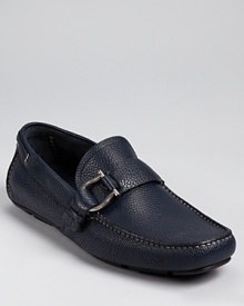 No need to sacrifice style for comfort. This handsome pebbled leather driver easily handles both, with Salvatore Ferragamo's signature gancini buckle at the side and a soft, inviting silhouette. No need to sacrifice style for comfort. This handsome pebbled leather driver easily handles both, with Salvatore Ferragamo's signature gancini buckle at the side and a soft, inviting silhouette.