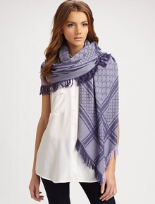 Wool/silk GG pattern shawl with fringe trim. About 45 X 49 70% wool/30% silk; dry clean Made in Italy Wool/silk GG pattern shawl with fringe trim. About 45 X 49 70% wool/30% silk; dry clean Made in Italy