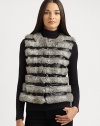 Stripe it luxuriously with bands of fluffy dyed rabbit fur on a leather-look vest, making a striking impact.Round necklineHook-and-eye front closureFully linedAbout 22 from shoulder to hemBody: Dyed rabbit furTrim: LeatherDry clean by fur specialistImportedFur origin: ChinaSIZE & FITModel shown is 5'10 (177cm) wearing US size Small. 
