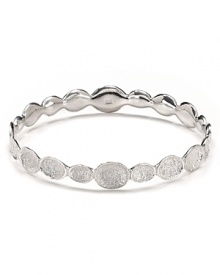 Textured 'pods' shine in silver plated brass in this infinity bangle from Melinda Maria. Textured 'pods' shine in silver plated brass in this infinity bangle from Melinda Maria.