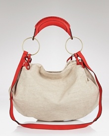 Linen and leather prove a chic combination on this slouchy hobo from Sequoia, sure to add natural wonder to your day-to-day looks. Linen and leather prove a chic combination on this slouchy hobo from Sequoia, sure to add natural wonder to your day-to-day looks.