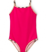 In sweet pea pink, this one-piece Burberry swimsuit adds vibrant poolside style to adventurous afternoons.