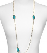 Alexis Bittar's long chain necklace boasts beautiful turquoise stations with crystal encrusted bezeled settings. Drape it on over a slinky knit or silky dress for added drama.