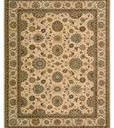 Floral medallions connected by a complex labyrinth of vines distinguish the well-composed design of this rug. Machine woven from the highest quality wool and meticulously dyed for a richly varied color palette to bring a unique accent of luxury to the home.