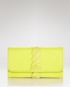 Organize your plastic (and business card) collection with this sublimely-twisted little bundle from See By Chloé. Use it as a wallet or tuck it under your as a conveniently fab clutch.
