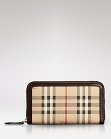 A chic wallet from Burberry in the house's iconic check. A chic wallet from Burberry in the house's iconic check.