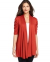 NY Collection's swingy cardigan adds a soft element to any tank, tee or turtleneck in your closet!