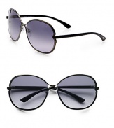 Sleek, shiny metal frames in a modern, round shape. Available in shiny gunmetal with smoke gradient lens. 100% UV protectionMade in Italy 