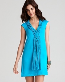 Nanette Lepore's island-inspired tunic refreshes with a bold, saturated hue. Nanette Lepore's island-inspired tunic refreshes with a bold, saturated hue.