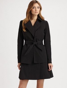A refined, feminine take on the classic trench, tailored with a slightly fuller skirt and a structured, cropped overlay.Foldover collarNotched lapelsOpen, cropped overlaySelf tie beltFully linedAbout 37 from shoulder to hem82% cotton/18% silkDry cleanMade in France of imported fabricModel shown is 5'11 (180cm) wearing US size 4. A refined, feminine take on the classic trench, tailored with a slightly fuller skirt and a structured, cropped overlay.Foldover collarNotched lapelsOpen, cropped overlaySelf tie beltFully linedAbout 37 from shoulder to hem82% cotton/18% silkDry cleanMade in France of imported fabricModel shown is 5'11 (180cm) wearing US size 4.