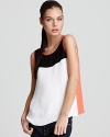 A bold color block design adds modern flair to this Aqua tank, a lightweight layer that's heavy on forward style. A black and white palette is perfectly accented with vibrant orange.
