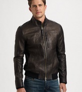 A modern approach to the classic motorcycle jacket, this soft leather style has a zippered chest pocket and a banded hem, in a washed, well-worn finish.Zip frontStand collarChest welt, waist slash pocketsBanded hemAbout 26 from shoulder to hemLeatherDry cleanMade in Italy