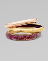 EXCLUSIVELY AT SAKS.COM. A bold set of 14k plated metal and resin covered bangles to stack along the wrist.Resin covered skin 14k goldplated Total width, about 2½ Made in USA Please note: Pattern may vary. 