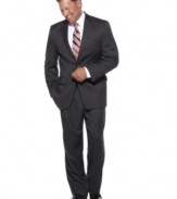 Nothing beats the elegant simplicity of a good suit, and this blazer is no different. Classic pinstripe pattern all over with wide, notched lapel and besom pocket at chest. Four button closure at cuffs. Center vent.