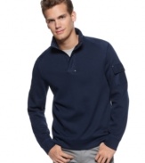 Get some culture.  This French-ribbed sweater from Calvin Klein has a worldly appeal to take your look from provincial to polished.