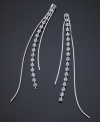 Take your style to new lengths with these stunning GUESS earrings featuring beautiful strands of crystal accents set in silvertone mixed metal. Approximate drop: 4 inches.