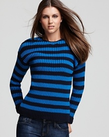 Show your stripes in this VINCE CAMUTO sweater, textured in a ribbed knit and perfect for completing your off-duty look. Show your stripes in this VINCE CAMUTO sweater, textured in a ribbed knit and perfect for completing your off-duty look.