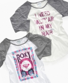 A beachy Roxy graphic on front gives this raglan-sleeve tee a sunny style that's perfect whether she's at the beach or in the classroom. A beachy Roxy graphic on front gives this raglan-sleeve tee a sunny style that's perfect whether she's at the beach or in the classroom.