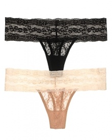 A sheer floral lace thong in a flattering silhouette from b.tempt'd.