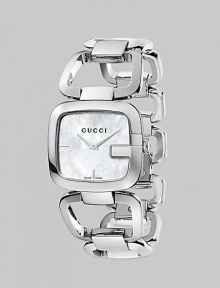 A signature style with a mother-of-pearl dial and a stainless steel bracelet. Quartz movementWater resistant to 3 ATMSquared stainless steel case, 32mm (1.2) X 30mm (1.1)Smooth bezelWhite mother-of-pearl dial with markersStainless steel link braceletMade in Switzerland 