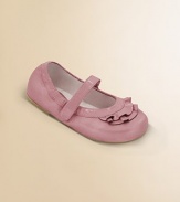 Lovable leather style with patent leather ruffles to perfect the look.Round toe Grip-tape closure Leather lining Padded insole Leather & rubber sole Imported