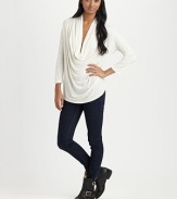 Dramatically draped cowlneck with long dolman sleeves and a lengthy silhouette. CowlneckLong dolman sleevesViscoseMachine washImportedModel shown is 5'9½ (176cm) wearing US size 4.