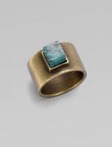 A structural piece with a square, center turquoise stone. TurquoiseBrassWidth, about ½Made in USA