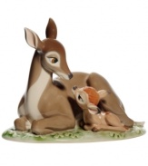 Disney fans will fawn over this beautiful figurine of Bambi gazing up at his doe-eyed mother. Handcrafted in Nao by Lladro porcelain.