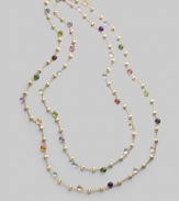 Long enough to double, this single strand necklace of 18k gold links is dotted with a colorful array of faceted semi-precious gemstones, including tourmaline, quartz, peridot, rhodolite, garnet, iolite, tanzanite, aquamarine, apatite, topaz, citrine and amethyst. Gemstones 18k yellow gold Length, about 47¼ Lobster clasp Made in Italy