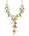 Brighten your look with bold style with a hint of summer color. INC International Concepts' Y-shaped necklace features plastic turquoise beads, oxidized brass tone accents and glass rondelles. Set in mixed metal. Approximate length: 21 inches. Approximate drop: 5 inches.