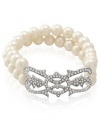 Support a worthy cause with style. Carolee's 40th Anniversary Limited Edition stretch bracelet, crafted from silver-tone mixed metal, features two rows of glass pearls for twice the glamour. Approximate length: 7-1/2 inches.