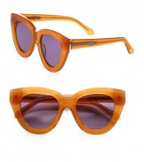 Feminine cat's-eye shape gets a sparkly update in tonal glitter acetate. Available in bright orange with smoke mono lens.Acetate temples with black metal arrow logoCategory 3 UV protectionImported