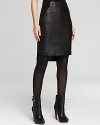 A sophisticated Rebecca Minkoff leather skirt takes the season's leather trend to hautes heights. Work it uptown chic with refined booties or downtown cool with a moto-inspired pair.