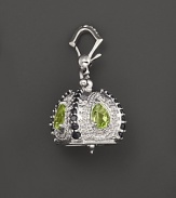 Inspired by Zen philosophy, this polished sterling silver Raja meditation bell from Paul Morelli is set with peridot and black spinel.