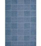 An a-tonal blocked design in lush blue creates a sophisticated, modern accent in the Westport area rug from Nourison. Hand-tufted in  India of pure wool for premium softness and durability.