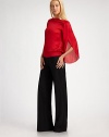 A must-have wide leg pant in a traditional wool blend.Darted at waist Side zip closure Wide leg Inseam, about 34 92% wool/6% nylon/2% elastan Dry clean Imported Additional Information Women's Premier Designer & Contemporary Size Guide 